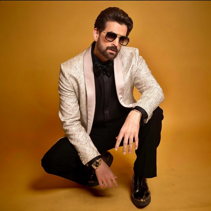 Neil Nitin Mukesh in Pristine Whiteness Tuxedo Set