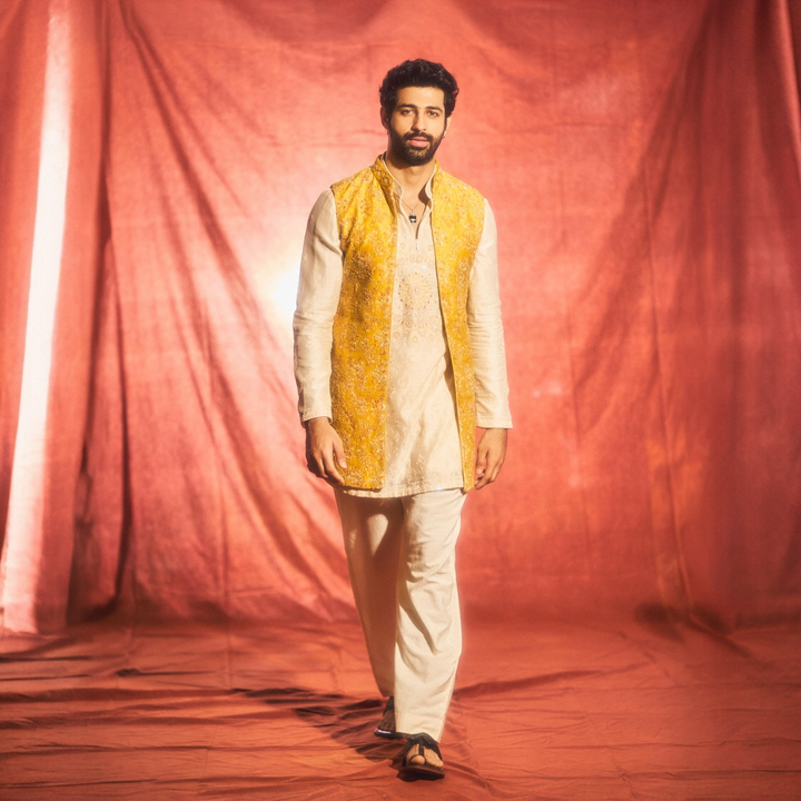 Ashim Gulati in Mustard Raw Silk Long Bundi with Cream Silk Short Kurta