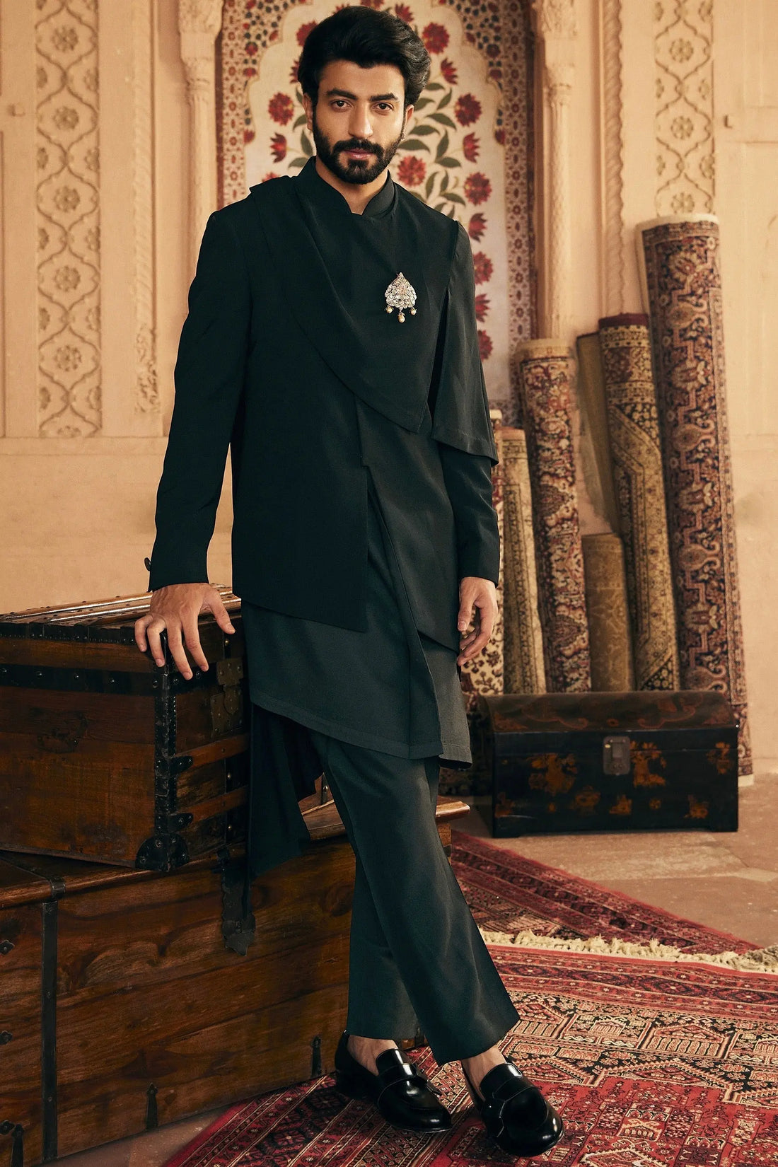 Asymmetric Allure: Indo-Inspired Ensemble with Gilded Brooch Accent