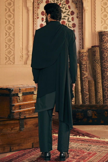 Asymmetric Allure: Indo-Inspired Ensemble with Gilded Brooch Accent